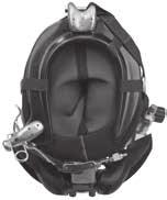 To don the helmet, the diver first slips the angled neck dam with the attached yoke over their head.