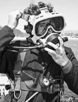 2.25 Donning the EXO Mask 1) Make sure that all other gear is properly donned, the air is on, and regulator functions and communications tests have been done.