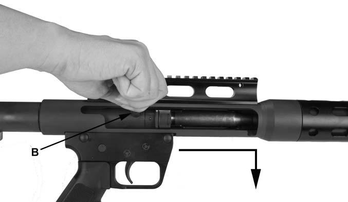 To load a round into the chamber, push the bolt handle (B) fully forward and down.