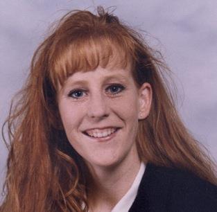 1996 July 1 - Courtney Carter became the first full-time female strength coach at Nebraska.