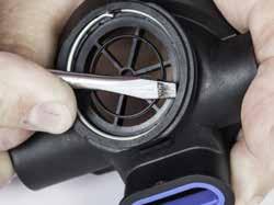 Assemble The Adjustment Packing Nut Subassembly Using a small screwdriver, or long nose pliers