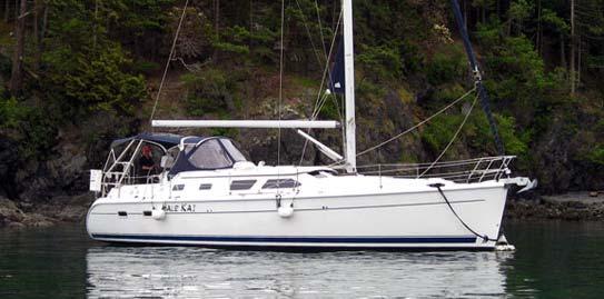 TV/DVD, inverter, AM/FM/CD stereo, microwave, electric heads. Spacious cockpit with walk-thru transom and stern rail seats.