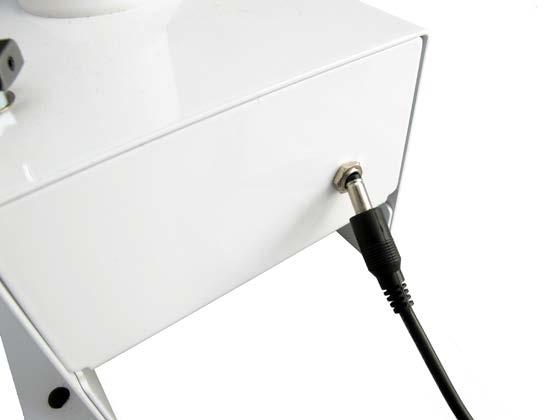 Plug the other end of the AC power cord into the wall outlet (Figure 5).