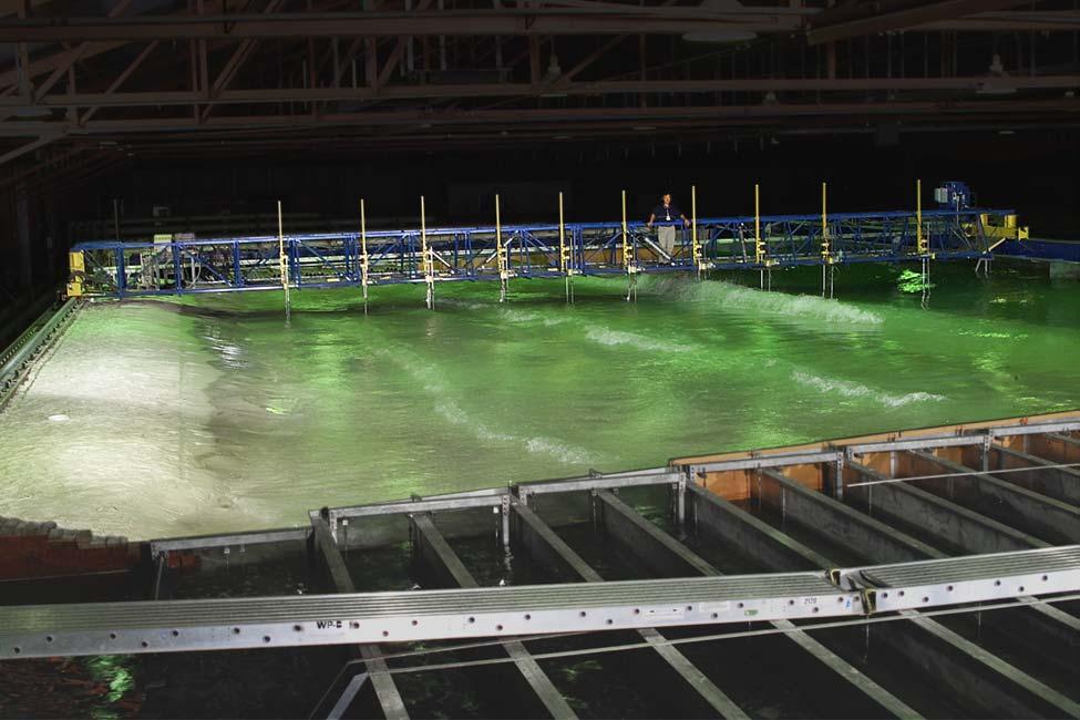 PHYSICAL MODEL DESCRIPTION Experiments were conducted in the Large-scale Sediment Transport Facility (LSTF) of the US Army Engineer Research and Development Center s Coastal and Hydraulics Laboratory.