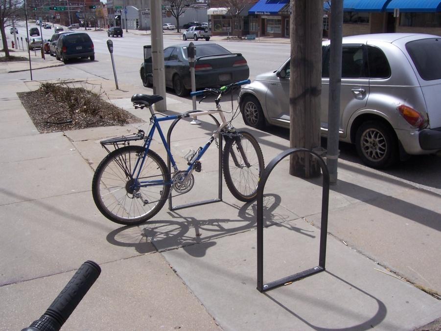 Sens 15 Figure 1 A bike locked to a U-rack in downtown Lincoln I determined the number of bikes that each rack could hold based on the type of bike rack.