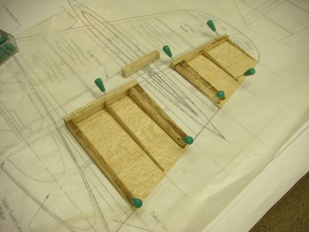 elevators and rudders and pin it over the plans. Build the elevators and rudder on top of the sheeting.