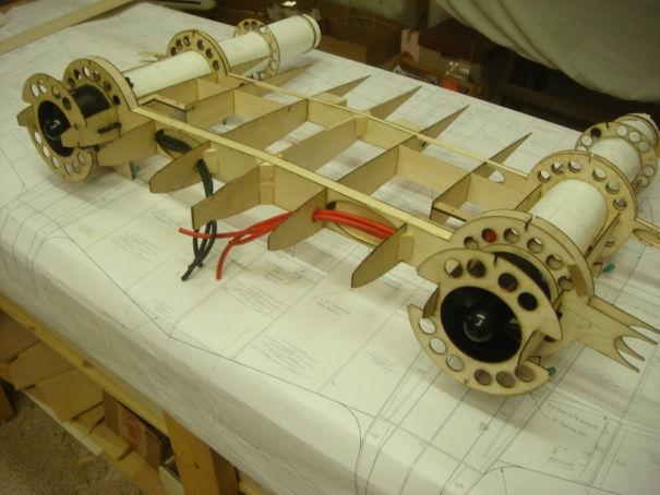 Glue ¼ sq. balsa from R3 to the main spar where the gear doors are angled. Remove the wing assembly from the board.