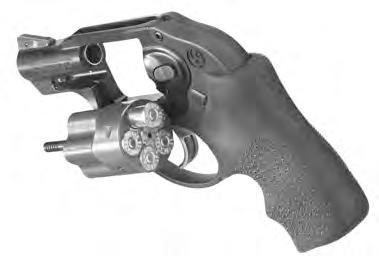 TO LOAD AND FIRE Be sure the revolver is pointed in a safe direction while loading. 1. Press the crane latch and guide cylinder out of frame to the left to its loading position (See Figure 5, below).