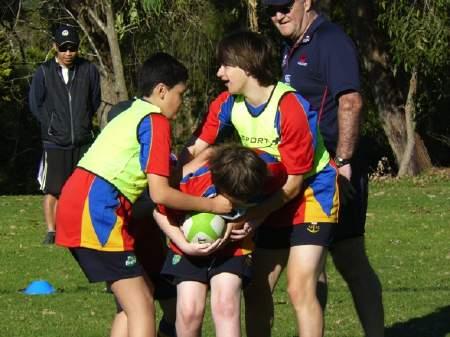 All activities are non- tackling rugby simulated games with a focus on ball handling, kicking, catching and passing.