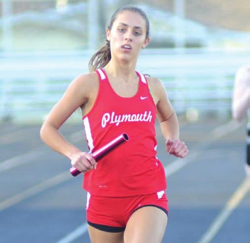 Wright finishes up the 1600 relay during a home meet early last spring.