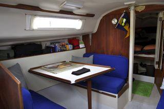 Ample storage is under this bunk with the center storage area being molded into the seat to keep items from resting against the hull and possibly in bilge water.