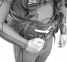26 BD BUOYANCY COMPENSATOR USER'S MANUAL Releasing the Weight Pouches Unlike a weight belt, which has only one release mechanism, each weight pouch is connected to the BC independently of the other
