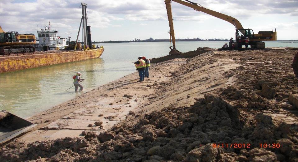 Shoreline Protection Orion track-hoes utilized for the rip rap subgrade were