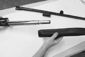 Instructions For Assembly Of Shotgun (cont d) 3. Remove the forend from the magazine tube. (See Picture 21). Picture 21 4.
