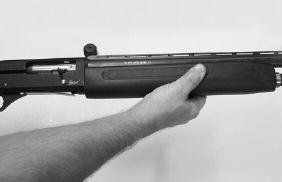 Slide the forend over the magazine tube. Do NOT force the forend.