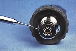 ) This O-ring is located in the track surrounding the high pressure inlet. 20 The DIN lockdown screw uses threadlock.