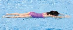 2. Take a breath, bend forward at the waist and put your face in the water until your ears are covered.