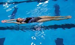 If you are going to start swimming the elementary backstroke, glide with your arms at your sides. Starting on the side from the pool wall To push off from the pool wall on your side: 1.