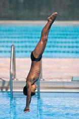 One-part takeoff with forward dive tuck from the springboard With your toes on the end of the board, repeat the forward dive tuck on the springboard using a one-part takeoff.