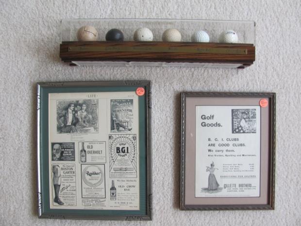 Photo #2402, Lot #46-48 46. History of the Golf Ball Display Remake display balls from the feather ball to the modern ball, in a (17 x3 x4 ) wood and plex-i-glass display, circa 1990 in vg condition.
