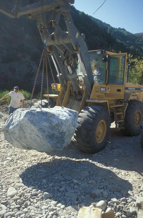 HAULING BOULDERS One of the contract requirements was to pick each boulder up to test the strength of rock anchor bolts.