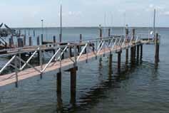 the aluminum marine frame and 18 x 44 inch cutting surface is designed to withstand dockside weather conditions (salt or fresh water).