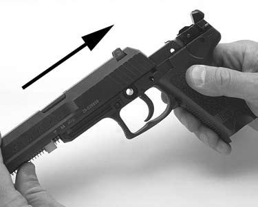 Be sure the slide moves freely on the frame and with the pistol cleared and pointed in a safe di rec tion, ensure all controls operate cor rect ly.
