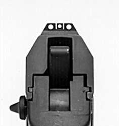 downward with the firing index finger or thumb will allow the magazine, re gard less of the number of car tridg es inside, to drop free of the frame.