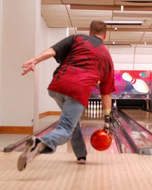 In each frame, the bowler gets two chances unless the first try is a strike (knocking all the pins down at one time).