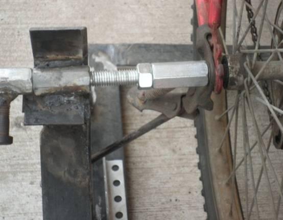 Weld couplings into holes on bike stand