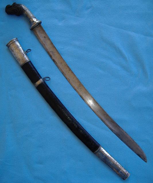A massive saber, likely Sumatran, with very wide European style fullers.