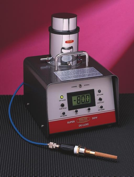 SuperDew De Luxe Displays any moisture in still or flowing dry air or gas. Mains operated dual hygrometer for flowing or still air. SDDLX. Can be used as a 240 v. portable. No measuring head. SDDL. Standard internal sensor fitted inside the measuring head.