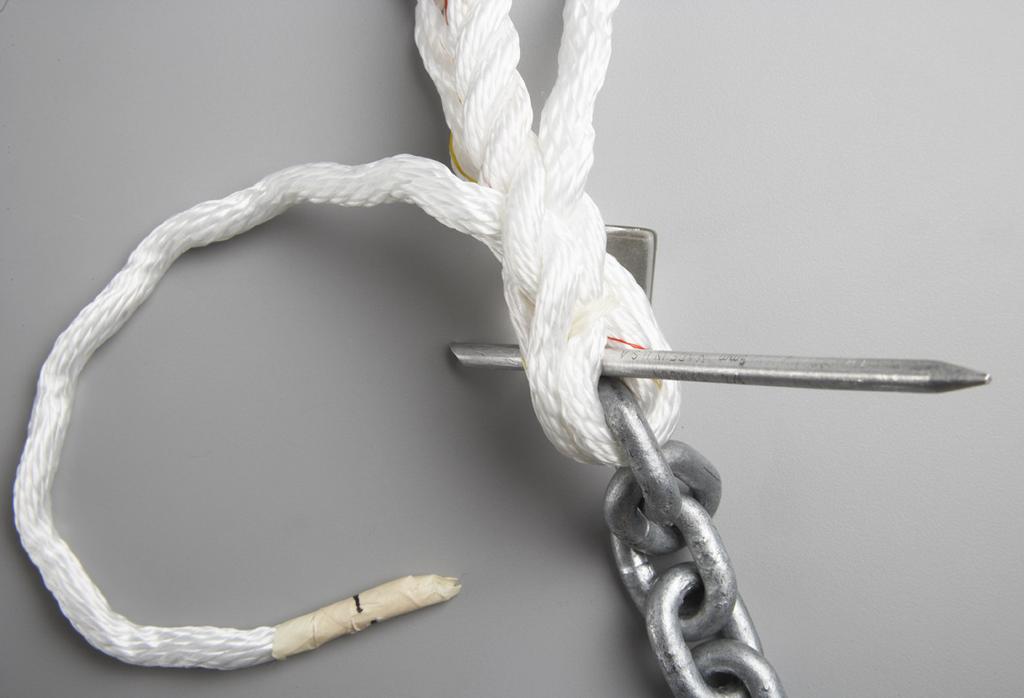 1) FIGURE 2 Step #2 - Line up the rope to the last link of the chain so that the II strand is in the middle and the I and III are on either end.