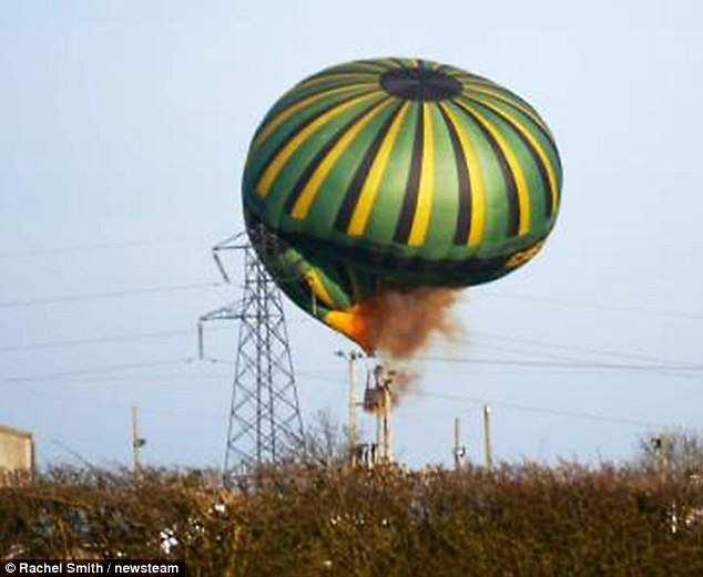 Hit: This is the dramatic moment the balloon crashed into the cables and was