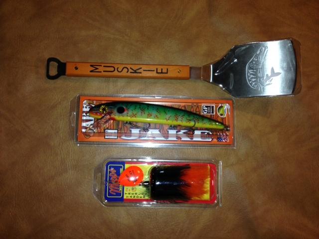 Lot #21: Lures and Migizi Muskie spatula 10 Jake Mepps Musky Marabou Migizi muskie spatula and bottle opener Lot #22: Migizi handcrafted rod, XLH 8 0 Heavy Thanks to Migizi for their support donating
