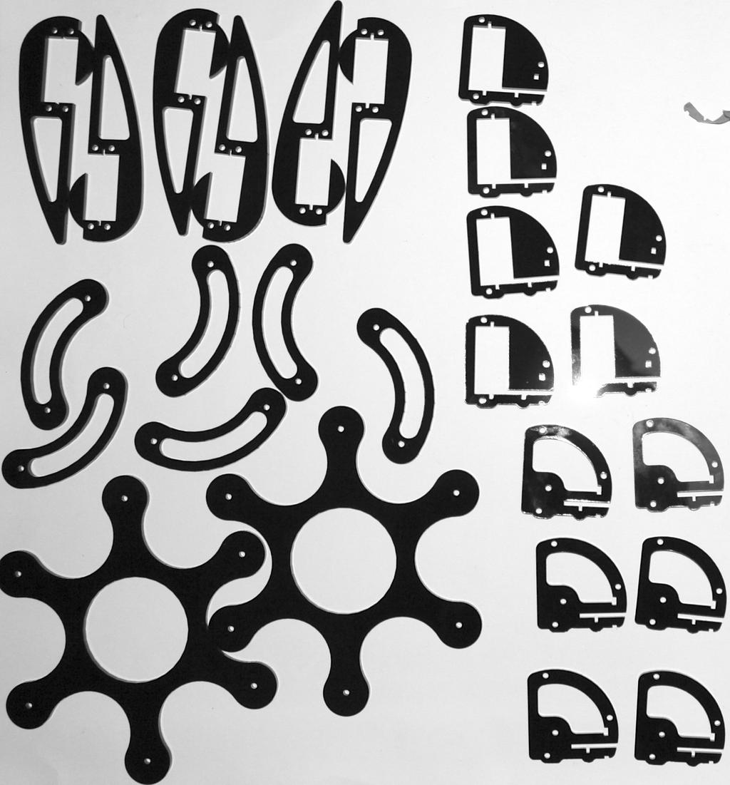 (a) CAD files of body parts for laser cutting machine (b) Cut body parts out of plexiglass using laser cutting machine Figure 2.4: Making body parts for SiWaReL hexapod 2.