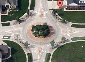 Section 2. Champaign-Urbana Existing Conditions Roundabouts are considered an to other traffic controls that help reduce crashes and improve safety at intersections.