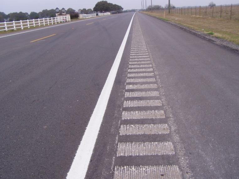 Shoulder Rumble Strips General Characteristics A shoulder rumble strip is a longitudinal design feature installed on a paved roadway shoulder near the travel lane (see Figure 67).