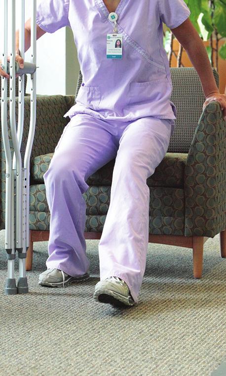 Standing up with crutches Slide your hips forward to the edge of the chair, bed or toilet seat.