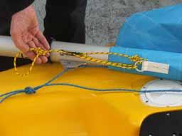 4) Untie the ends of the jib halyard and tie a figure of eight knot in the part that goes through the cleat.
