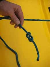 ratchet block in the middle of the boat (Photo 3) Ensure that the rope goes through
