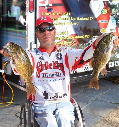 Jason Swanson of Plano, Texas, holds the bass that earned him a first place finish in the Paralyzed Veterans of America (PVA) 2011 National Bass Tour on Lake Winnipesaukee last summer.