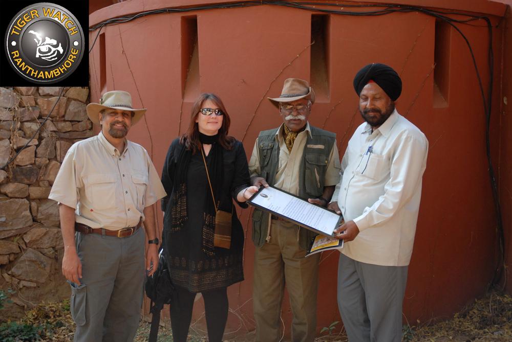 1. Mr. R. S. Kala, Ranger. Fateh Singh Rathore awarding Ranger Kala along with Tiger Watch Secretary Ashutosh Mahadevia and a personnel from the US Embassy With the co-operation of Mr.