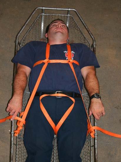 Pelvic Lash 1. Pull midpoint of webbing between legs, up to victim's waist, creating a 6-inch triangle.