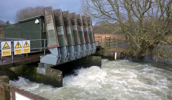 The weir at East Stoke with the PIT tag detecting vanes raised for their annual service. kelts (post-spawning salmon).