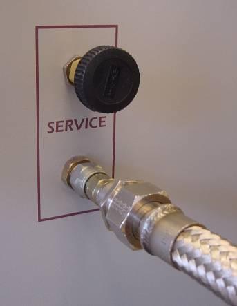 Routine Maintenance Service Valve Service Aeroquip Coupling Charging hose Figure 8-2: Service valve and access port 7) Attach a charging line from the service Aeroquip to a typical vacuum/charging