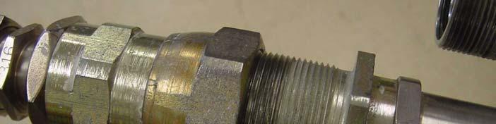 threaded portion of the male Aeroquip.