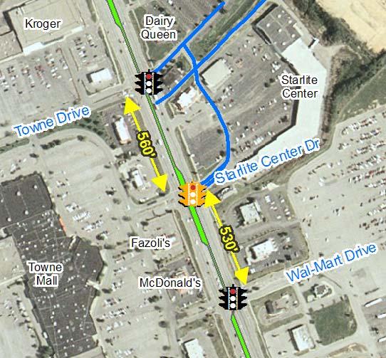 ACTION: TYPE: #2. Eliminate Traffic Signal Starlite Center Program DESCRIPTION: Currently along US 31W in front of Towne Mall there are three signalized intersections within less than 1,100 feet.