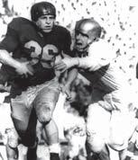 for three Pacific Coast Conference champions and was a member of the 1954 National Championship team Member of two Rose Bowl teams 1955 team MVP Team posted a 26-4 record in his three seasons