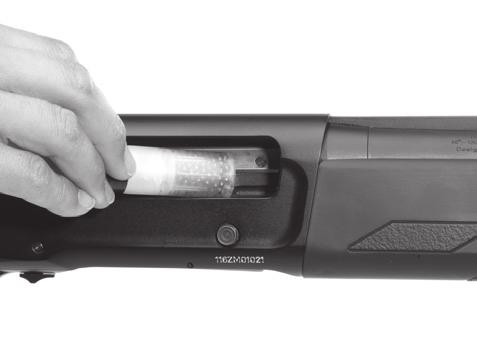 fed automatically to the chamber as the slide assembly closes. Another shell can then be inserted into the magazine to load it to full capacity.
